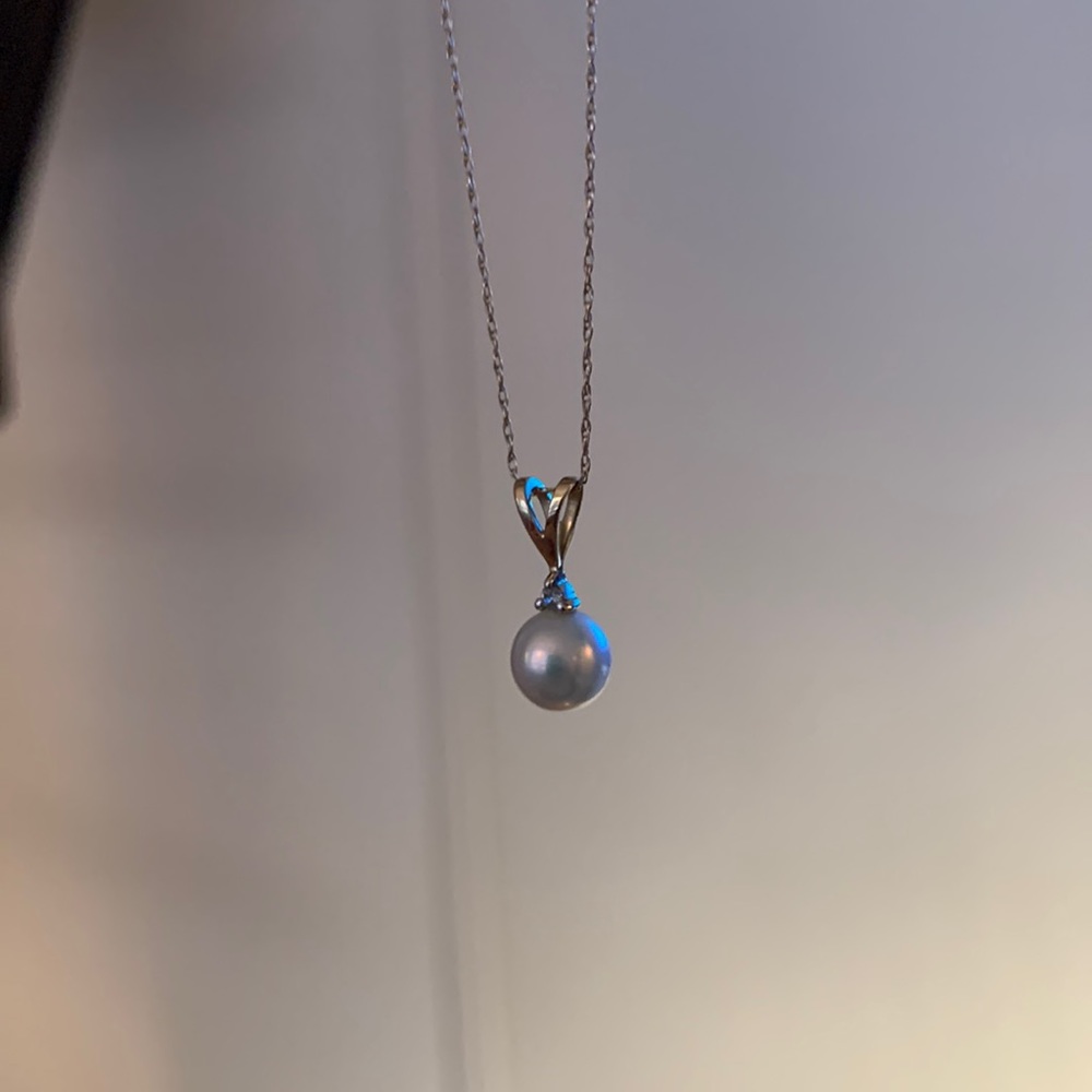 Breakup Gems: 14k pearl necklace with tiny diamond